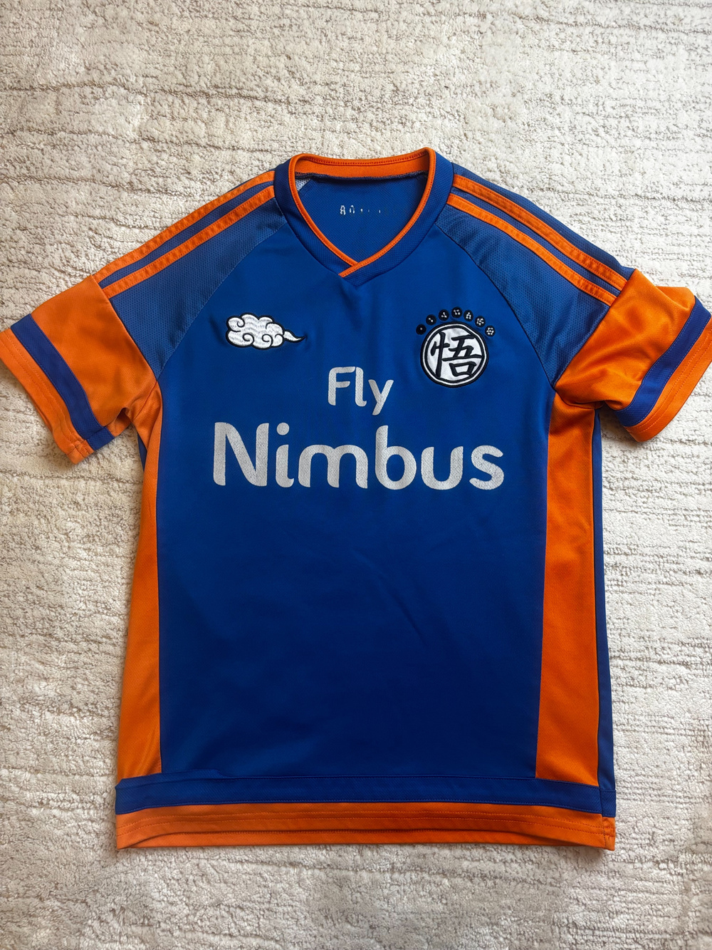 Box Lunch Dragon Ball Z Goku Fly Nimbus Soccer Jersey Blue Orange